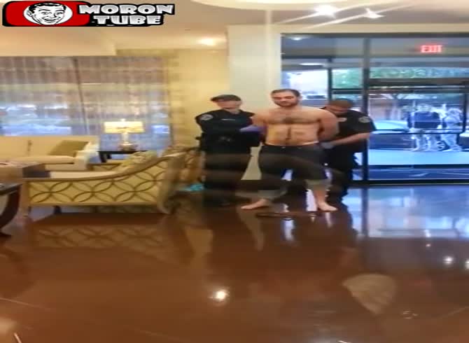 Video :A police officer accidentally feels a suspect's erect penis.